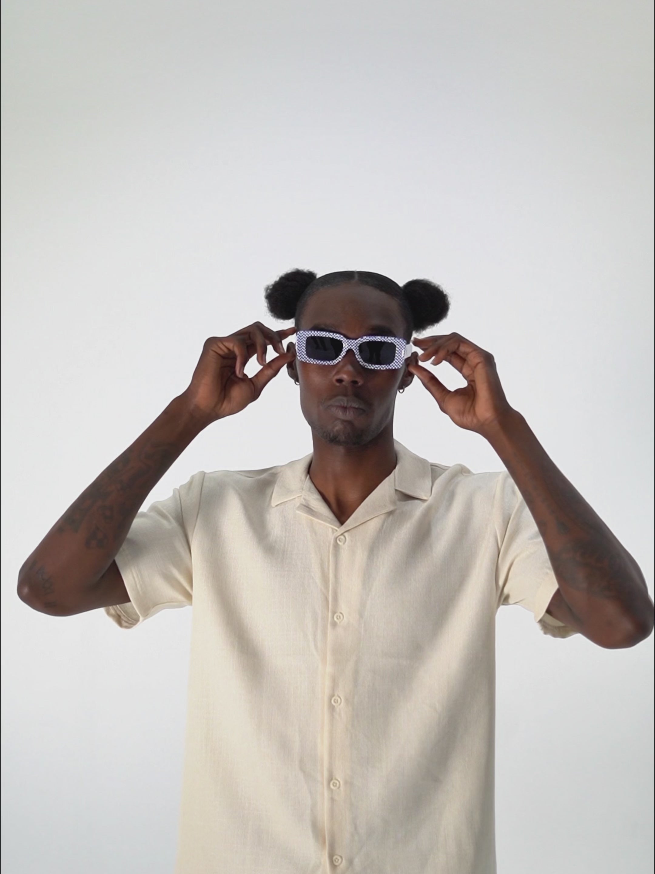 Video of Checkmate Blue sunglasses with blue lenses and sculpted shape

