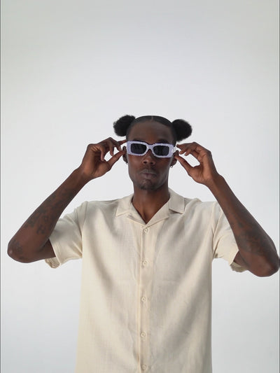 Video of Checkmate Blue sunglasses with blue lenses and sculpted shape

